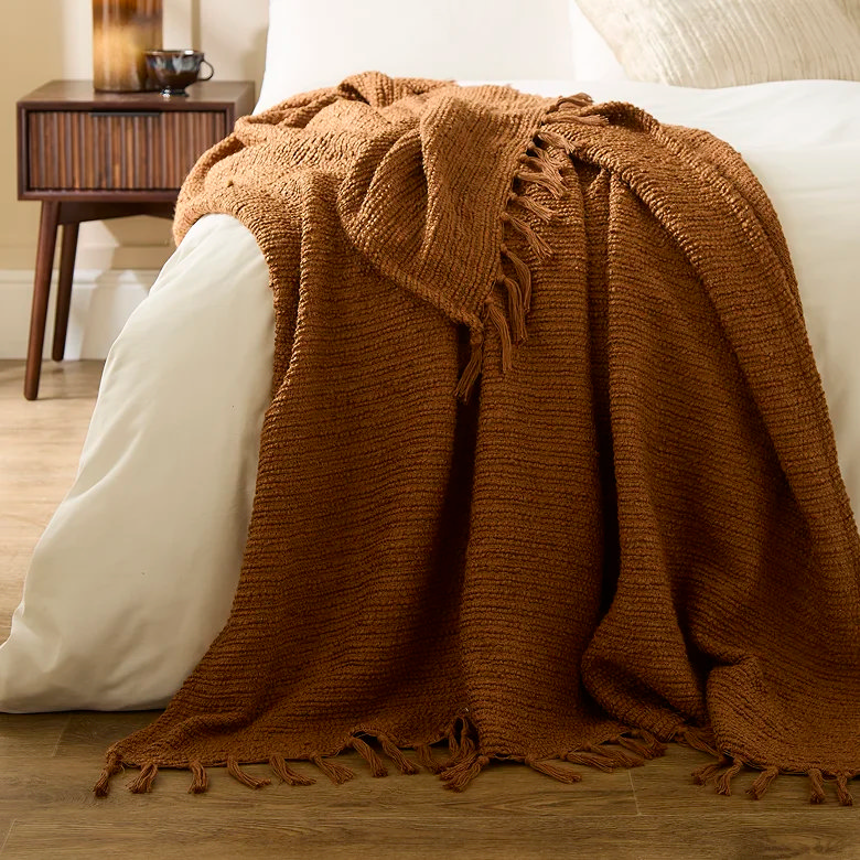 ginger brown boucle winter throw on bed