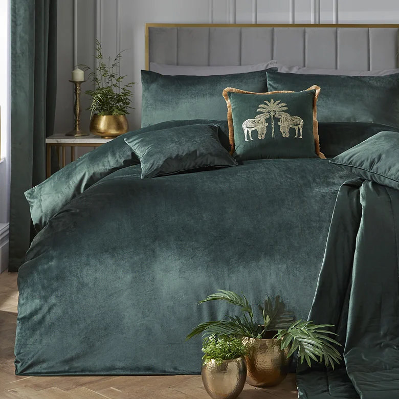 bottle green velvet duvet cover set with matching pillows and luxury bedroom styling