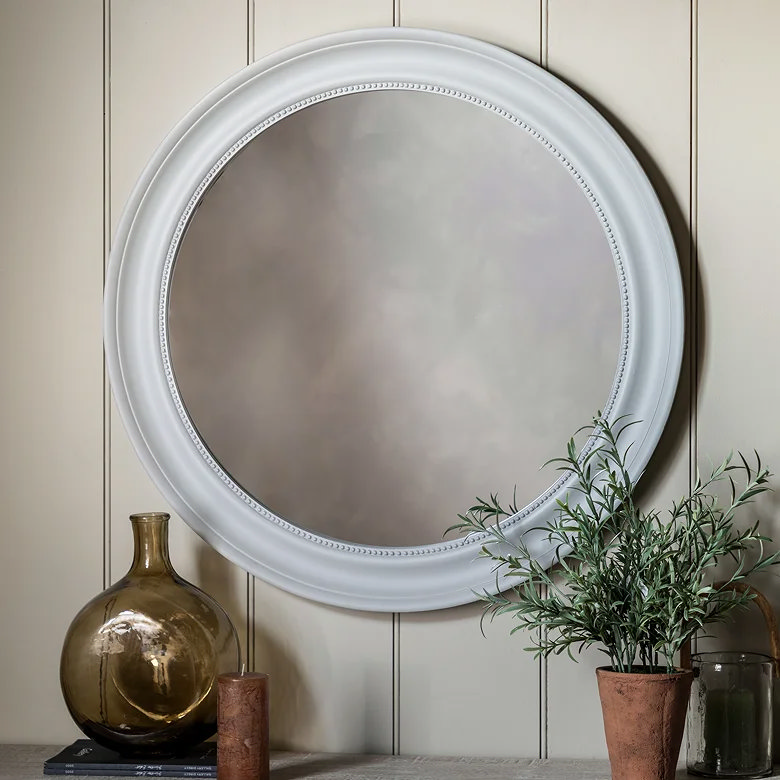 circular wooden bedroom mirror in stone grey