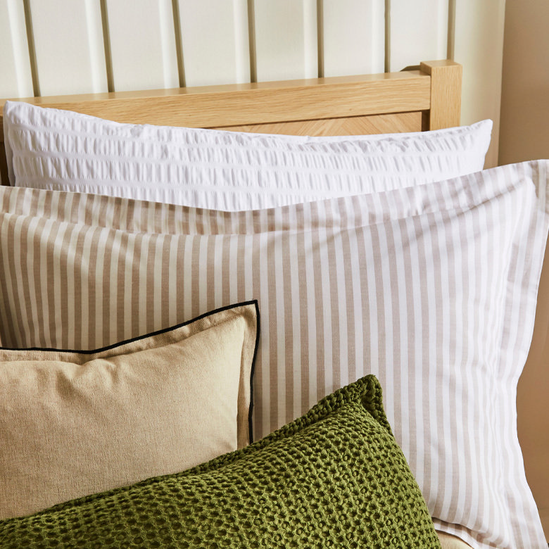 Four stacked pillows for hotel-style bedding