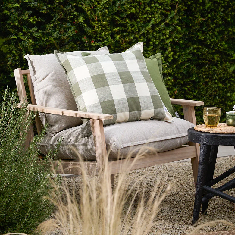 green check outdoor cushion on garden chair