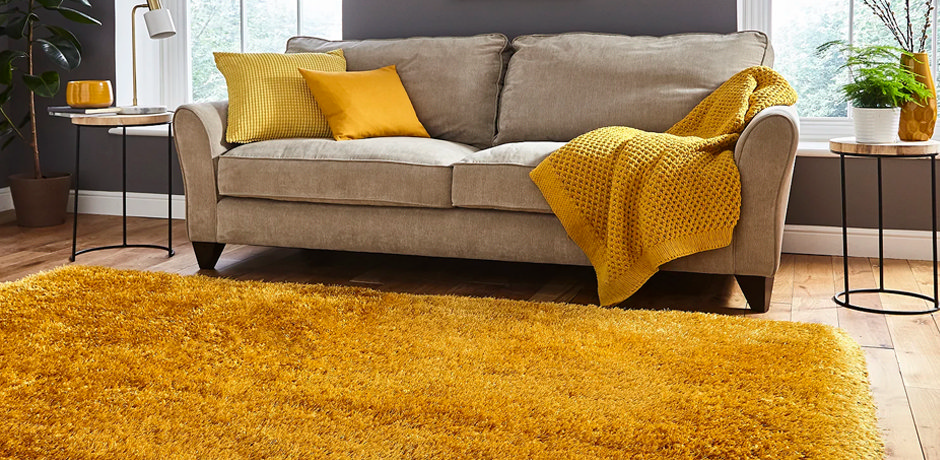 retro living room aesthetic with yellow rug, cushions