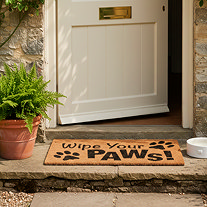 Wipe Your Paws Doormat outside on a step