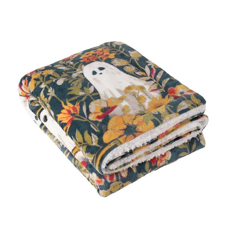 folded sherpa ghost and flowers blanket