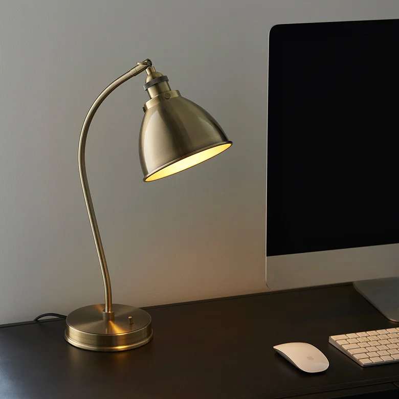 metallic retro desk lamp in home office