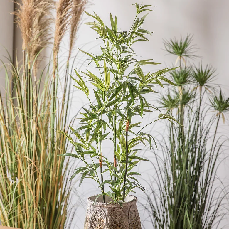 unique bamboo tree faux plant in bedroom
