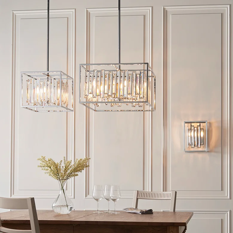 glass box pendant lights over dining table with crystal detail