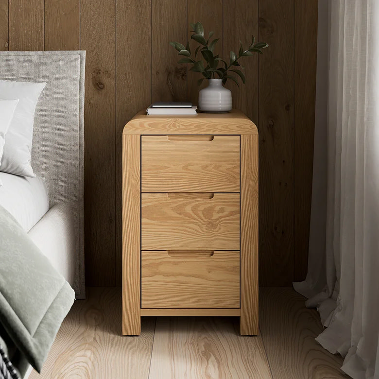 modern bedroom with oak 3 drawer bedside cabinet beside upholstered bed