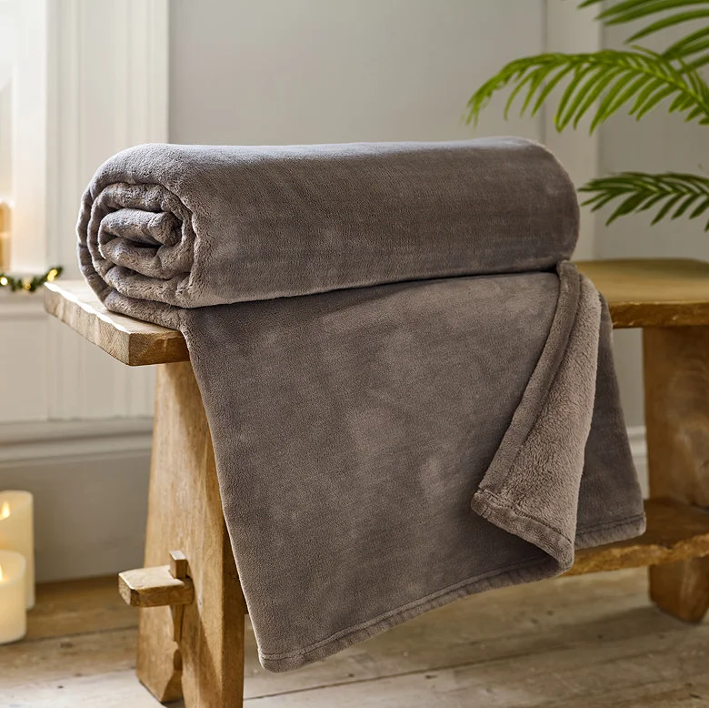 brown christmas couch throw stored in living room