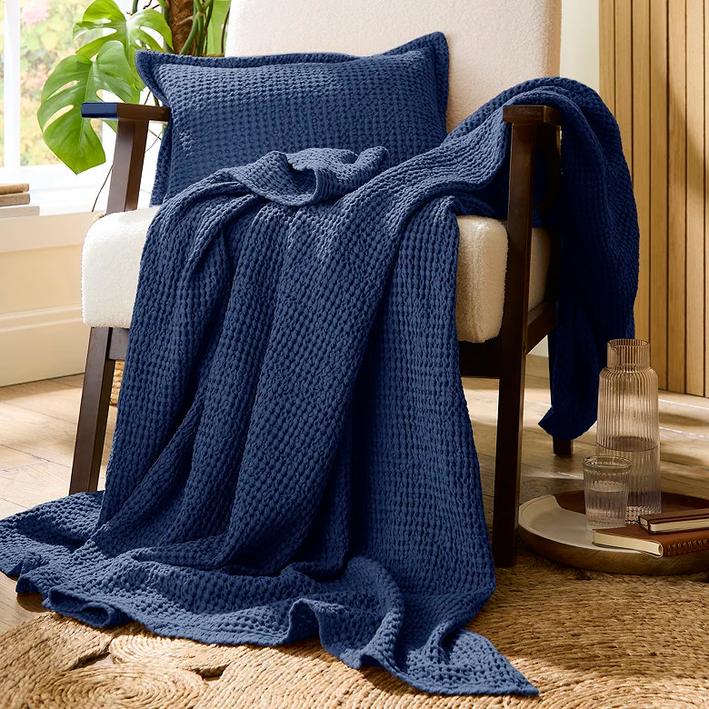 navy blue christmas couch throw in living room