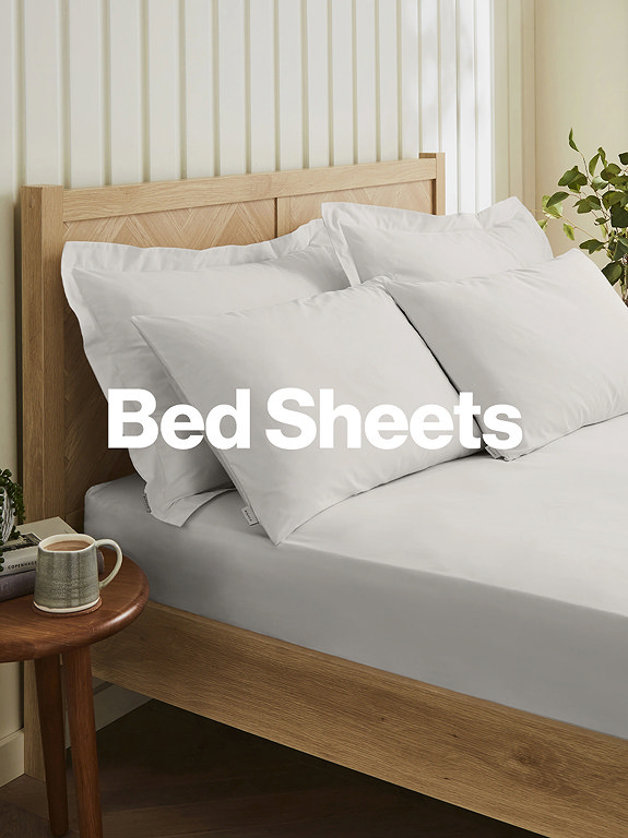 Bed Sheets on Bed