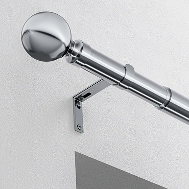22-25mm extendable eyelet ball curtain pole in satin silver stock image