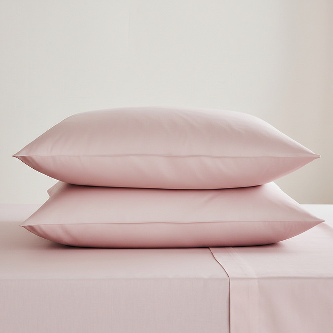 Pair of blush pink square pillowcases