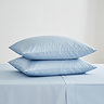 Pair of light blue square pillowcases
