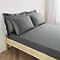 mattress on a bed covered with charcoal grey fitted sheet in 30cm depth, with matching pillowcases