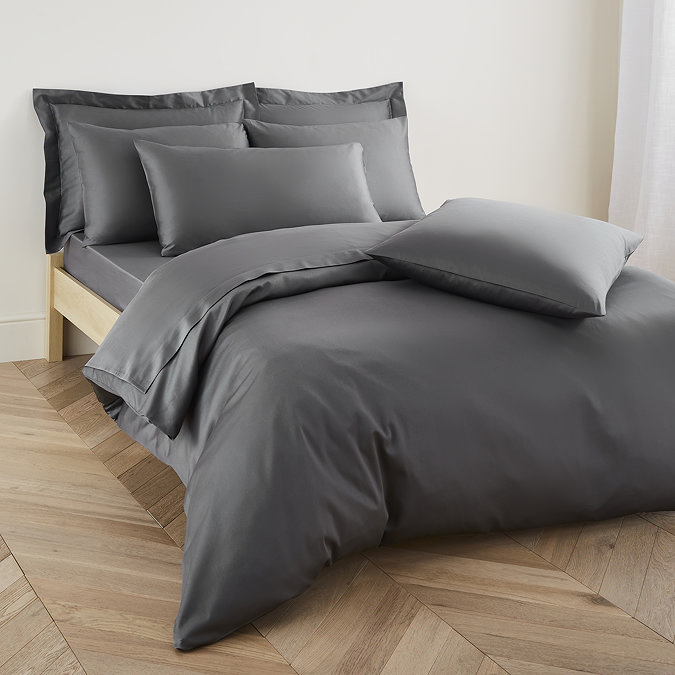 image of bed with charcoal grey duvet cover