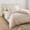 Cotton Sateen duvet cover in natural on bed image 1
