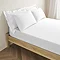 Extra Deep Fitted sheet in white on bed image 1