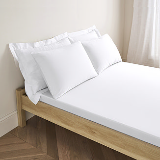 Cotton Sateen White Fitted Sheet on bed image 1