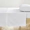 Flat sheet in white on bed image 1