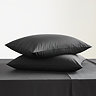 Pair of black king size pillowcases