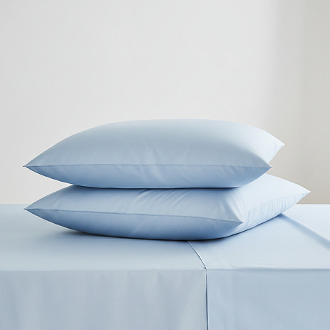 Pair of light blue king size pillowcases