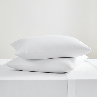 Pair of white king size pillowcases