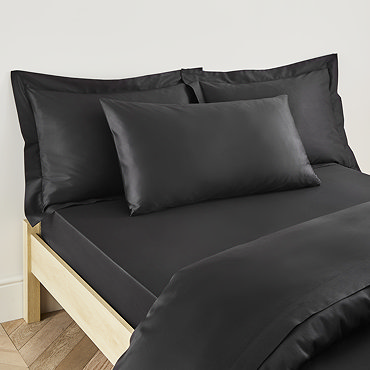 Kingsize pillowcase in black on bed image 2