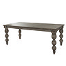 image cut out on white background of rectangular dark brown rustic dining table with carved legs