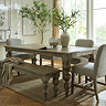 image of rectangular rustic dining table with carved legs and matching bench