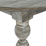 close up image of carved leg detail of dark brown round dining table