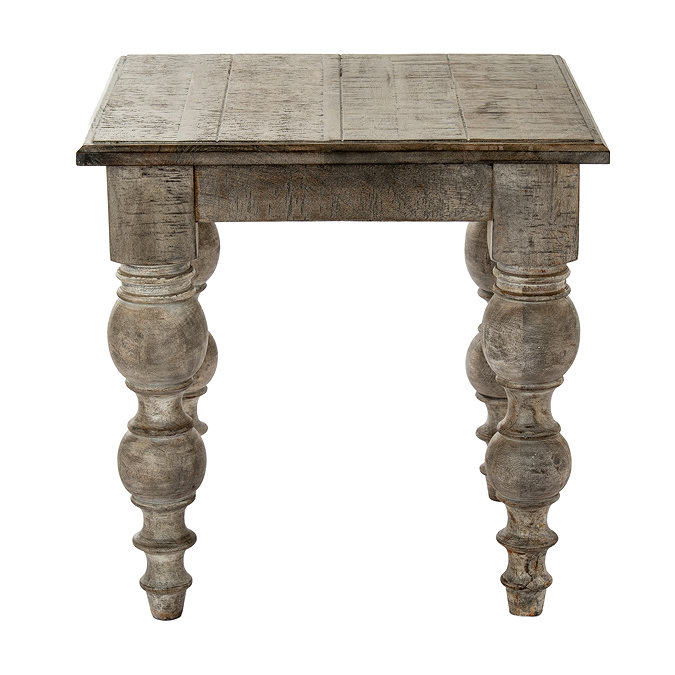 front on image cut out on white background of square dark oak panelled side table with carved legs