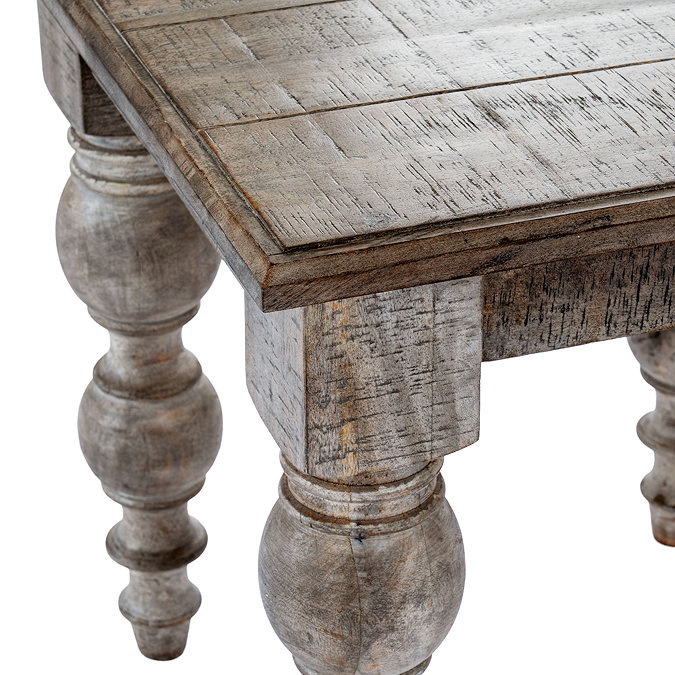 close up image of dark oak panelled edge of square side table