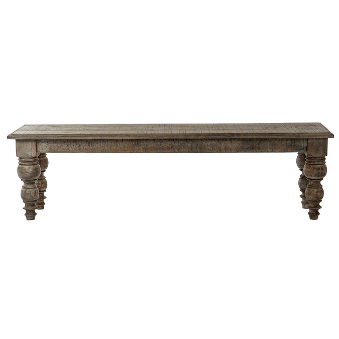 front on image cut out on white background of rectangular dark wood bench with carved decorative legs
