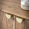 close up image of gold handles on acacia wood sideboard