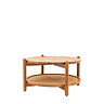 cut out on white background of round acacia wood coffee table with rattan lower shelf