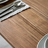 close up image of acacia woodgrain of large dining table