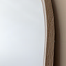 close up image of soft grey frame of arched overmantle mirror