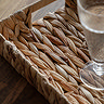 close up on woven detail of rectangular trays