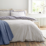 Amelie duvet cover set in blue on bed image 2