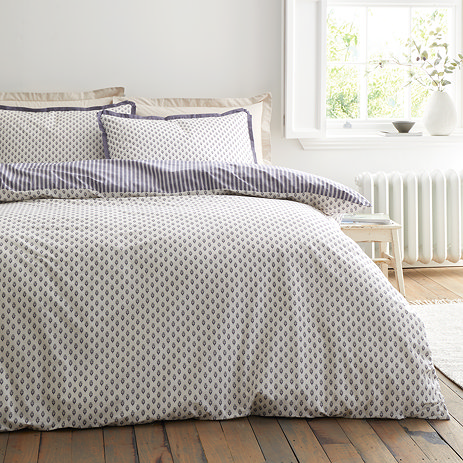 Amelie duvet cover set in blue on bed image 1