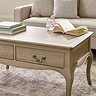 close up image of drawers on limed oak french style coffee table with antique handles