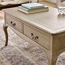 close up angled image of slim drawers of french style coffee table