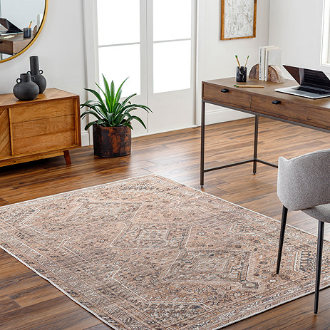 image of orange vintage rug on wooden flooring of home office
