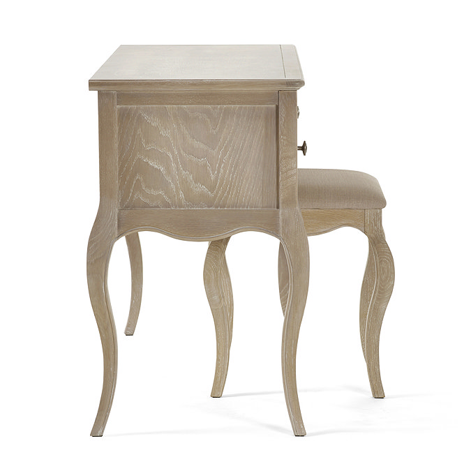 side-on image of oak french dressing table, cut out on white background