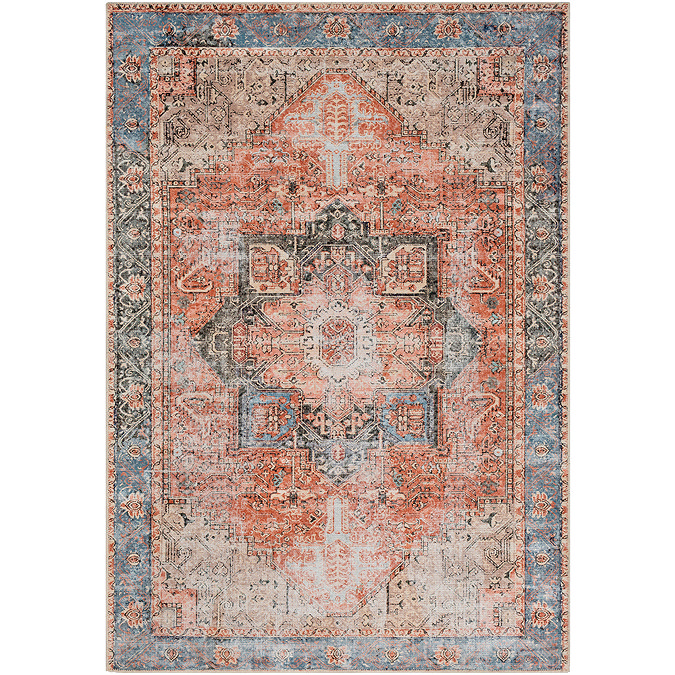image cut out on white background of vintage rug in rust and blue shades
