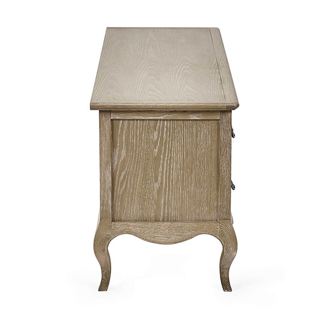 side on cut out image of french style tv unit in limed oak