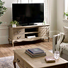lifestyle image of french style tv unit with limed oak finish, on wooden floor