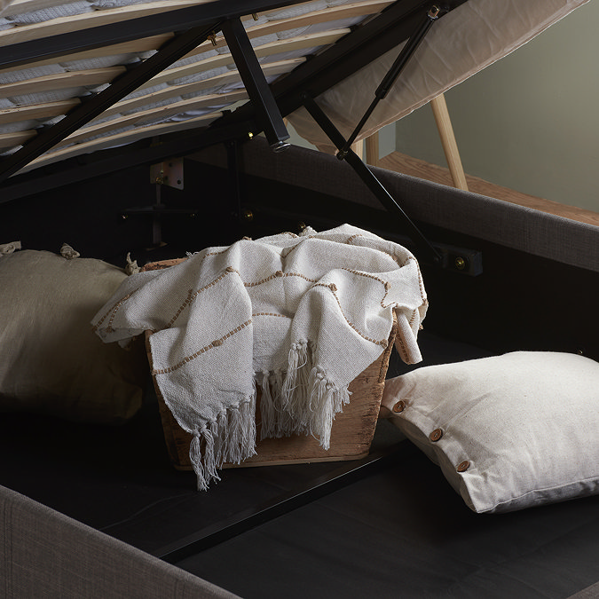 close up image on inside of ottoman storage compartment