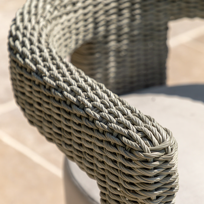 close up image of wicker material of round backed garden chair
